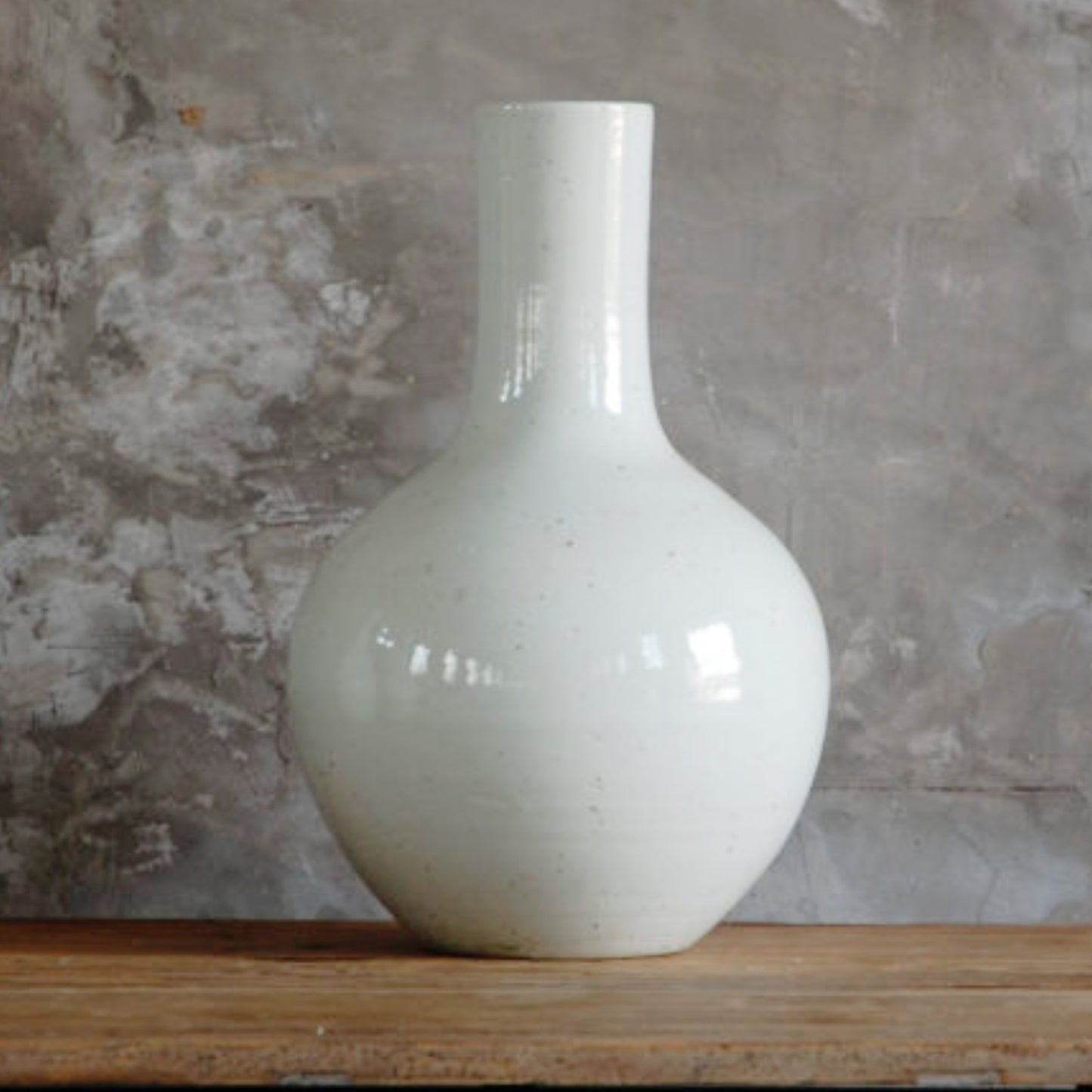White Glaze Vase with Curved Base